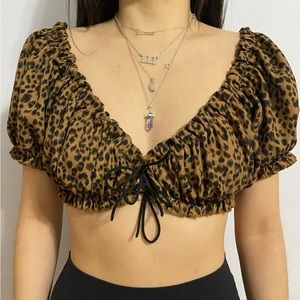 puff sleeve princess tie top in a cheetah print pattern